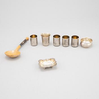 A set of Russian silver beakers and a salt cellar.