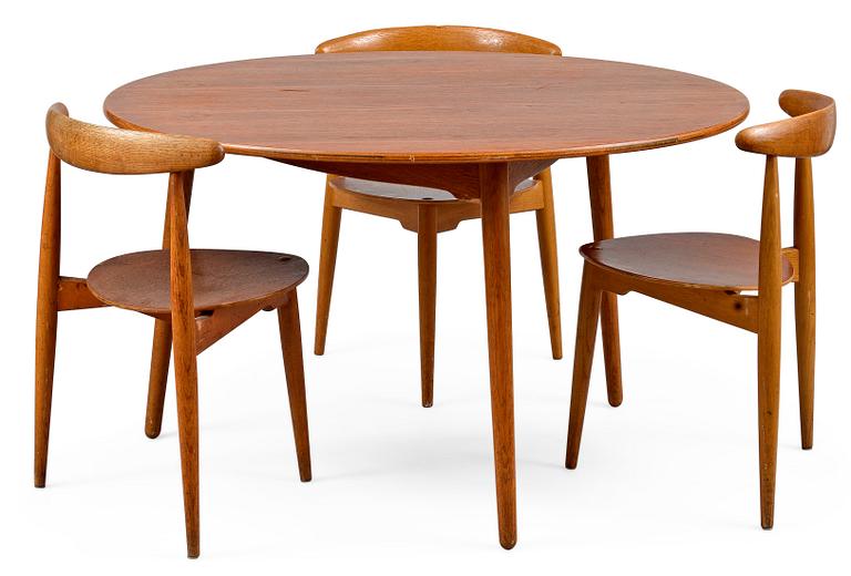 Hans J. Wegner, A SET OF SIX CHAIRS AND A TABLE, The Heart Chair. Beech and oak, teak on seats.