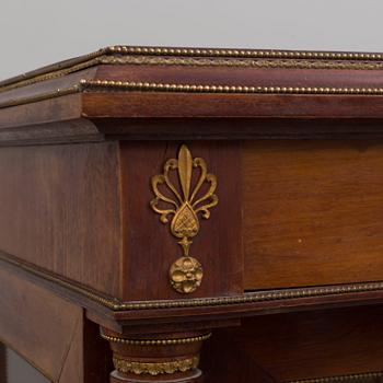 A mahogany veneered Empire style cabinet, circa 1900.