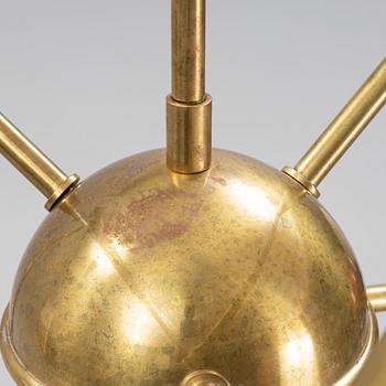A mid 20th Century brass celiling light.