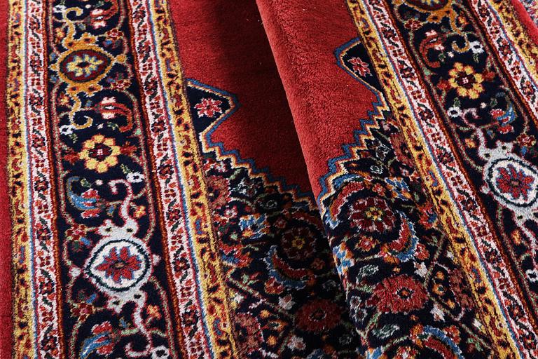 A rug, Tabriz, ca 241 x 167 cm.