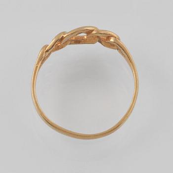 RING, 18K guld och vitguld med 2 åttkantslipade diamanter, Kattfotstämplad. Vikt 1,8 gram.