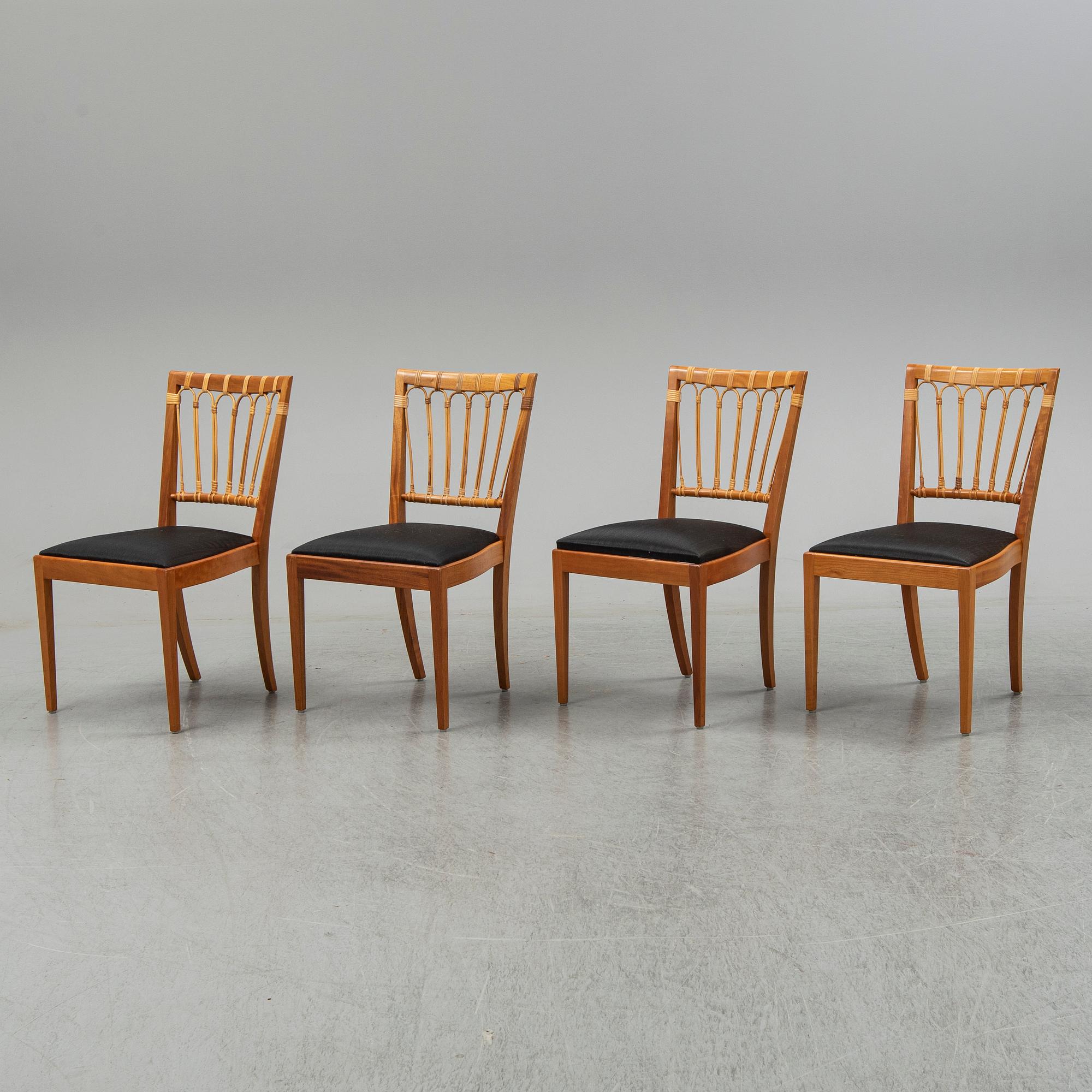 A set of four mahogany and rattan dining chairs, Josef Frank, , model 1165, Svenskt Tenn, Stockholm.