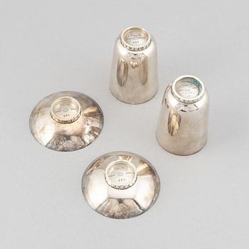 Sigvard Bernadotte, two beakers and two ashtrays, Copenhagen 1945-77, sterling silver, design nr 825A and 825.