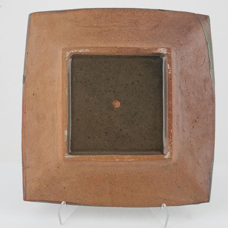 Shoji Hamada, in the manner of, glazed stoneware dish, 20th century.