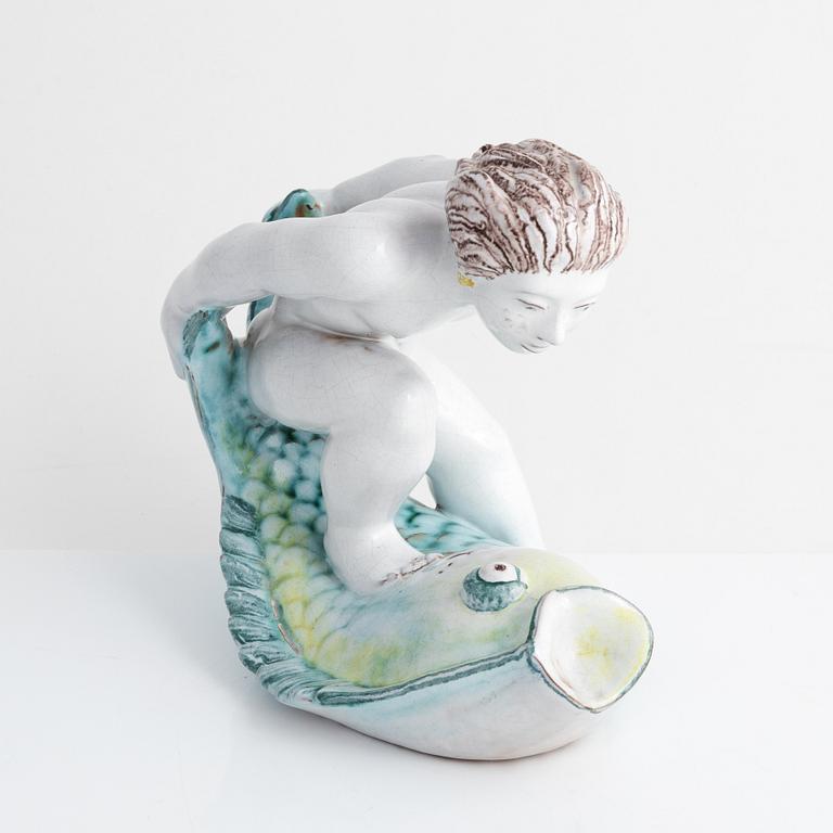Tyra Lundgren, a faience figurine, Rörstrand, dated -30.