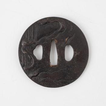 A round iron tsuba, mumei, Japan, Edo-period.