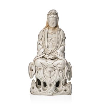 801. A Chinese blanc de chine figure of Guanyin, Qing dynasty, 18th Century.