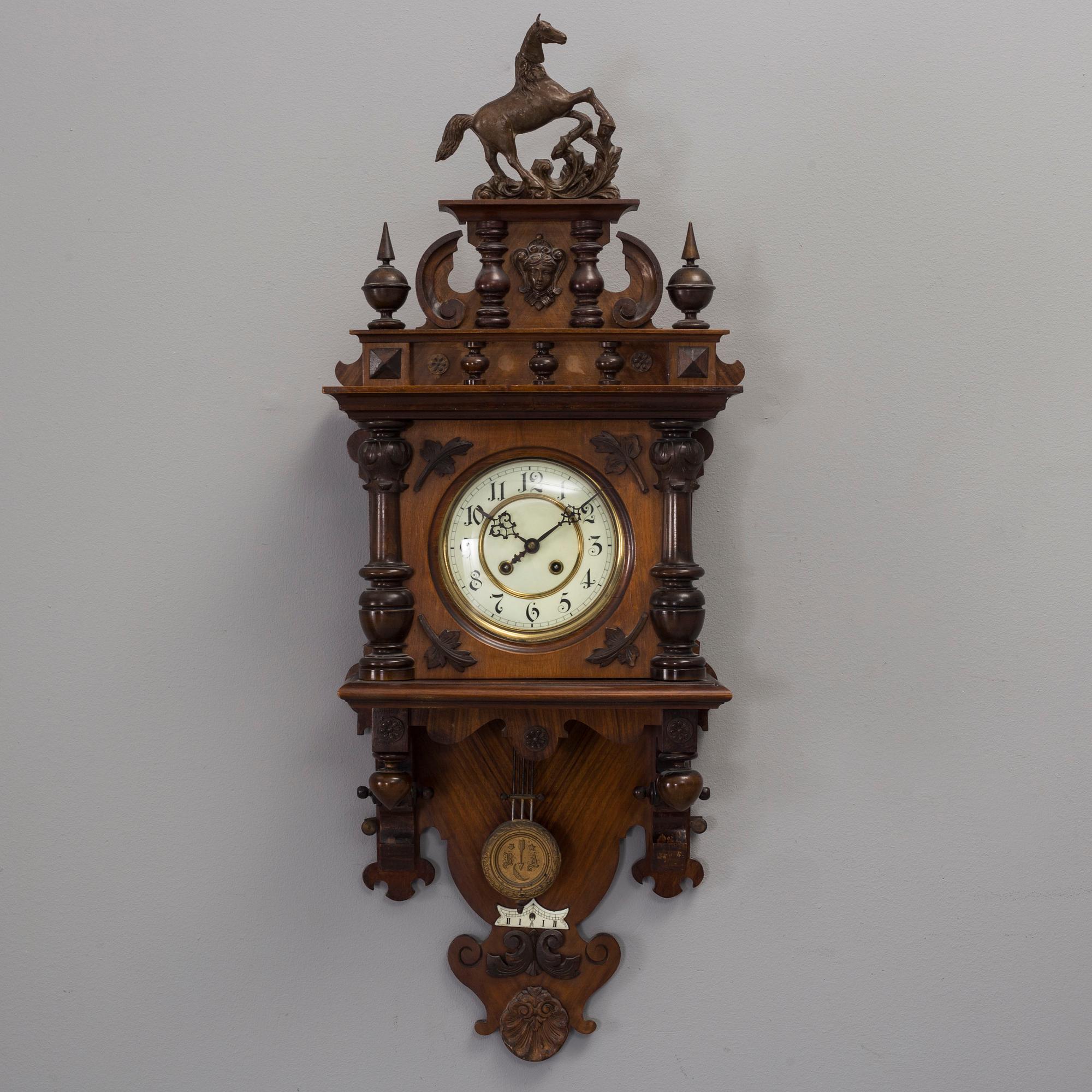 A circa 1900 Renaissance style wall clock.