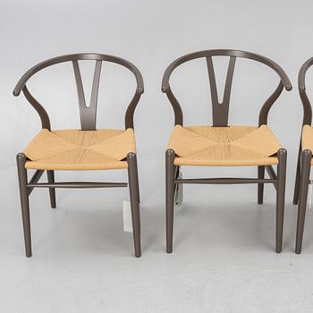 Hans J. Wegner, four CH 24 chairs, Carl Hansen & Son, Denmark.