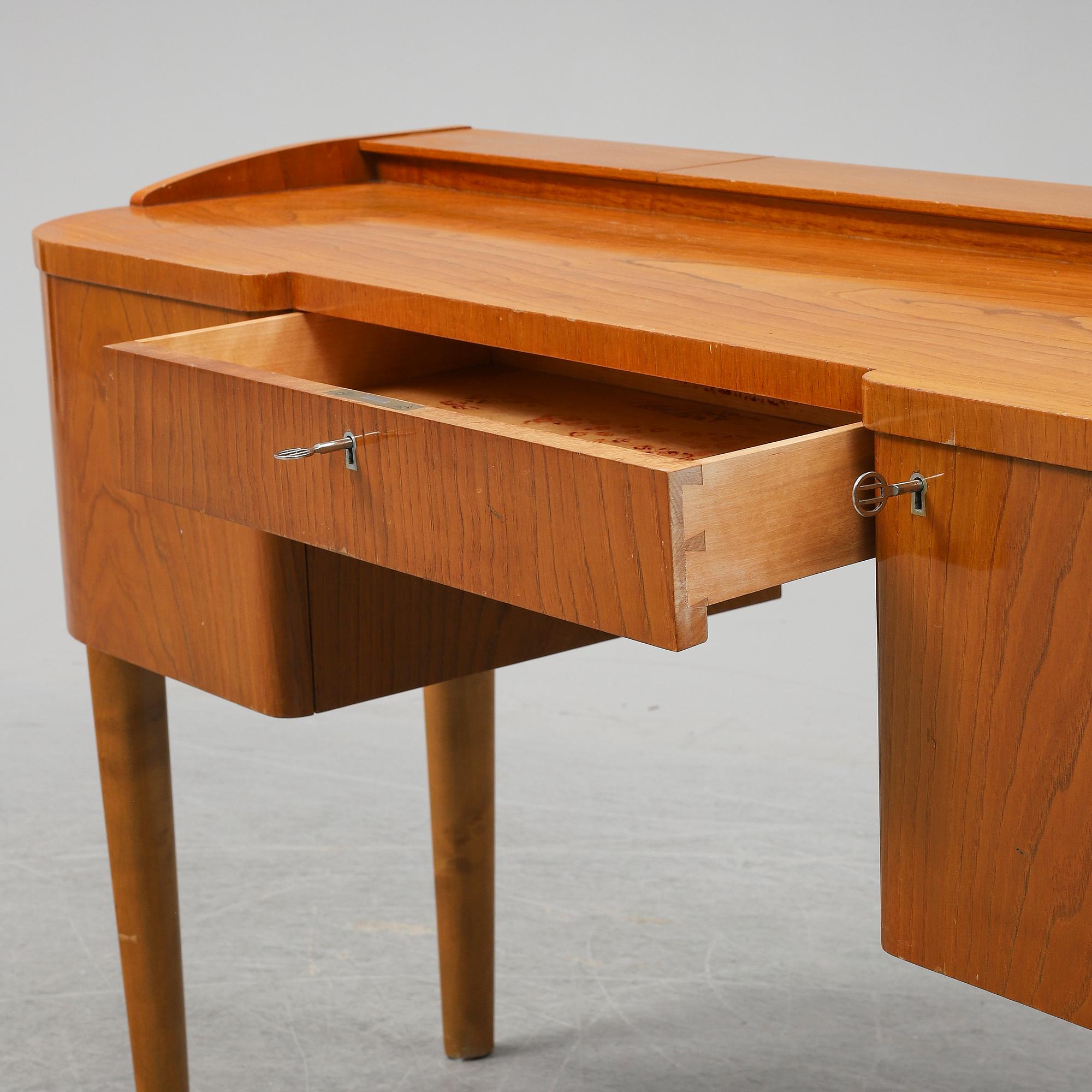A 1940's table with pouf.