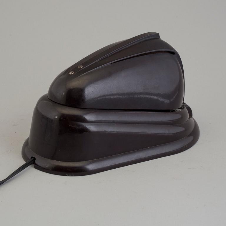 a bakelite and metal table 'Bolide' table lamp, by JUMO, 1940's.