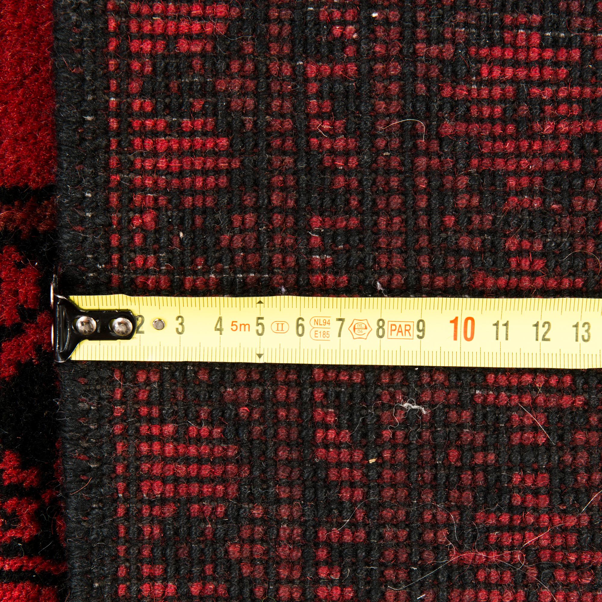 An Afghan carpet, old. Circa 255 x 337 cm.