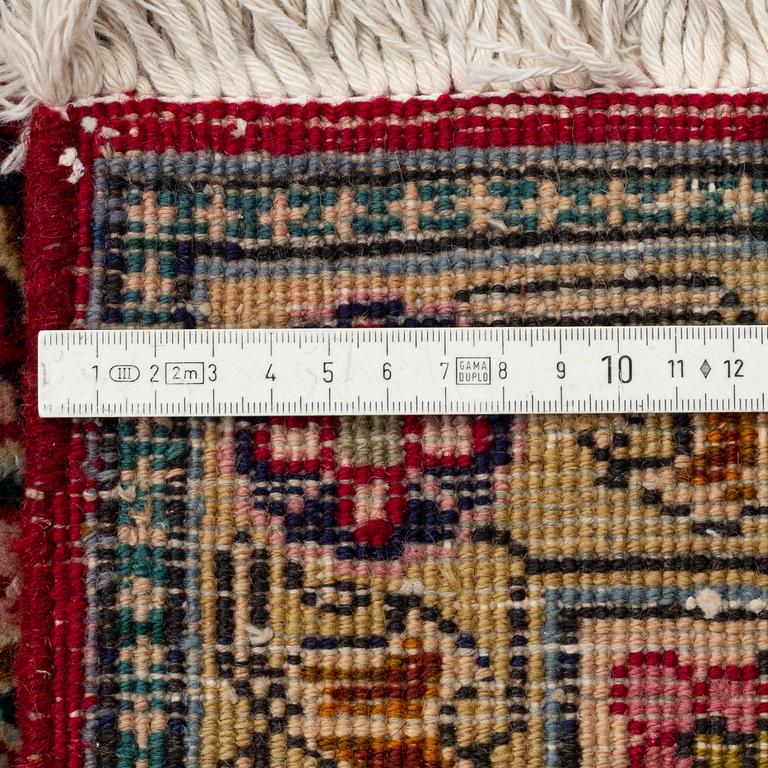 A Tabriz Carpet, circa 316 x 220 cm.