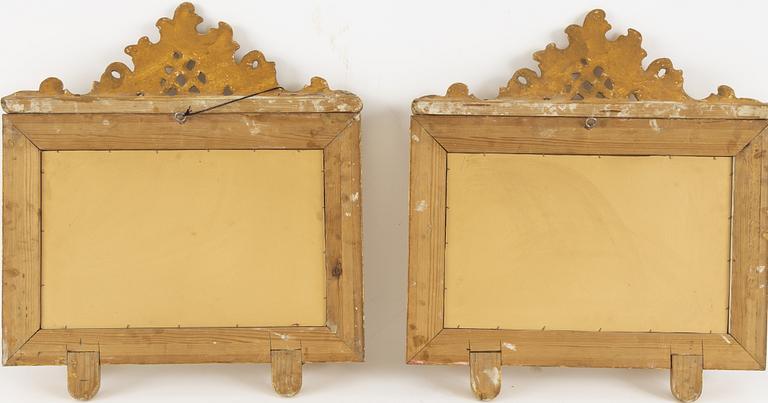 A pair of rococo-revival giltwood two-light girandoles, circa 1900.