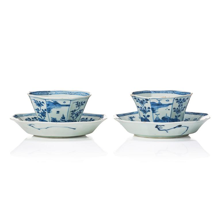 A pair of octagonal blue and white cups with stands, Qing dynasty, Kangxi (1662-1722).