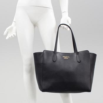 Handbag "Swing tote" by Gucci.