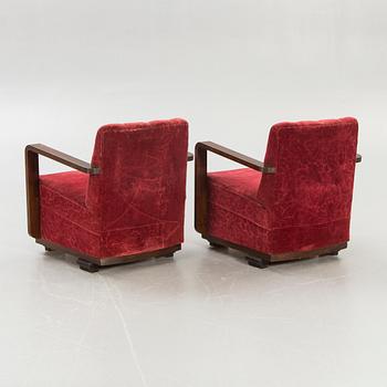 A pair of 1940s easy chairs.