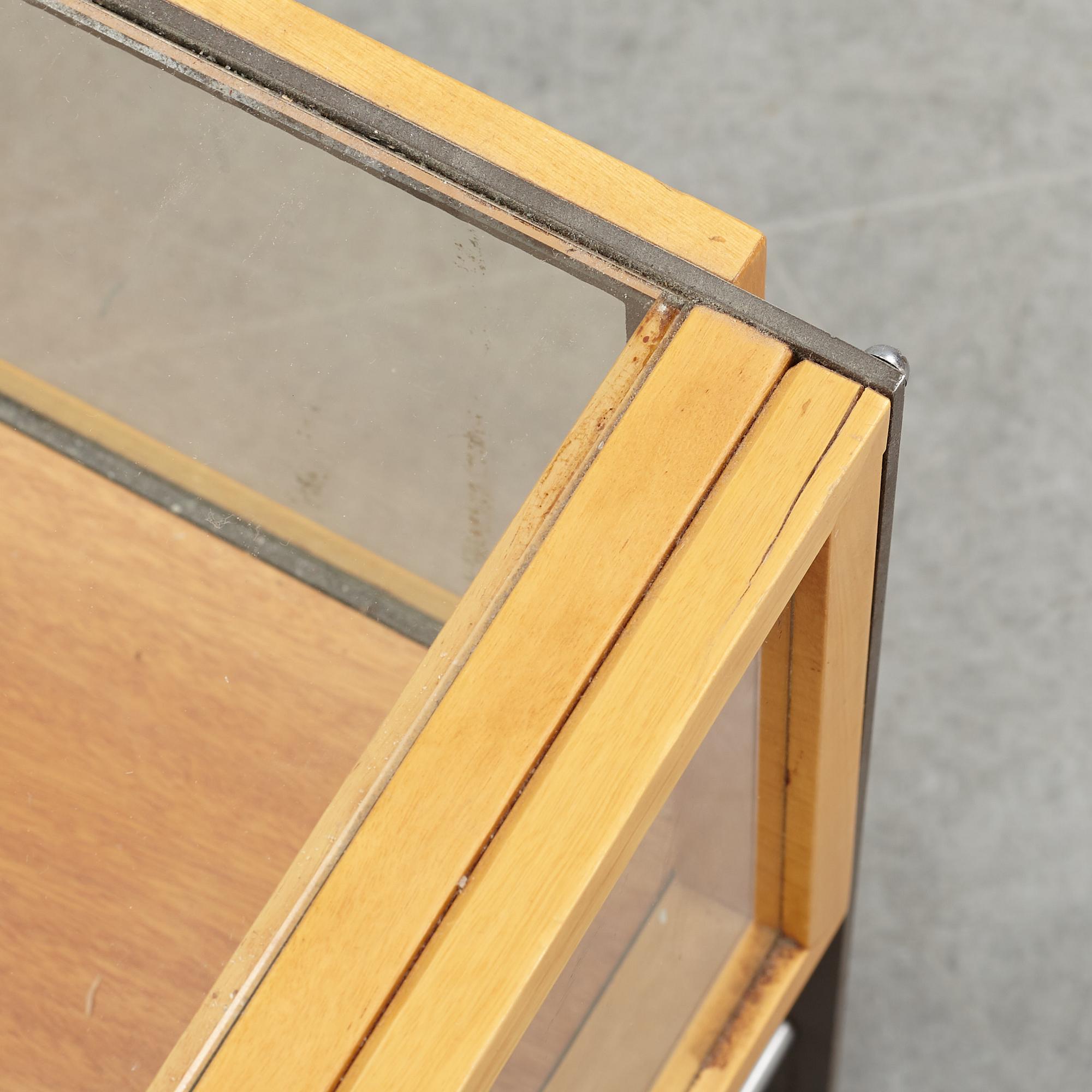 A glass top coffee table, late 20th Century.