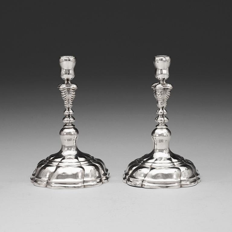 A pair of German mid 18th century silver candlesticks, possibly of Carl David Schröder, Dresden 1750-1775.