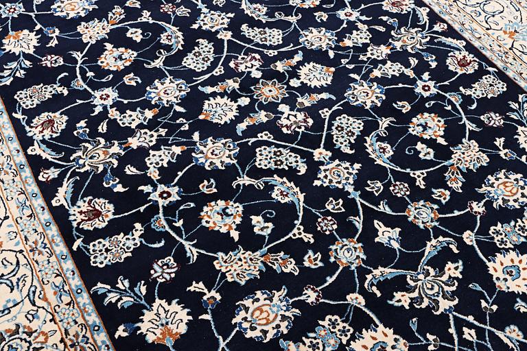 A part silk Nain rug, 9LA, c. 302 x 198 cm.