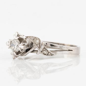 Ring, set with a brilliant-cut diamond.