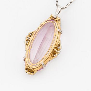 A pendant in 18K gold and platinum with a faceted kunzite.