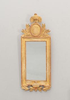 A Swedish gilded signed Gustavian mirror by CG Fyrwald.