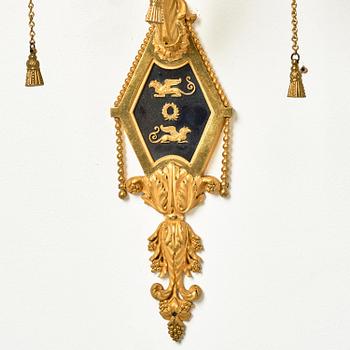 A pair of two-branch late Louis XVI ormolu and blued steel appliques attr. to F. Rémond (bronzier in Paris 1774-1812).