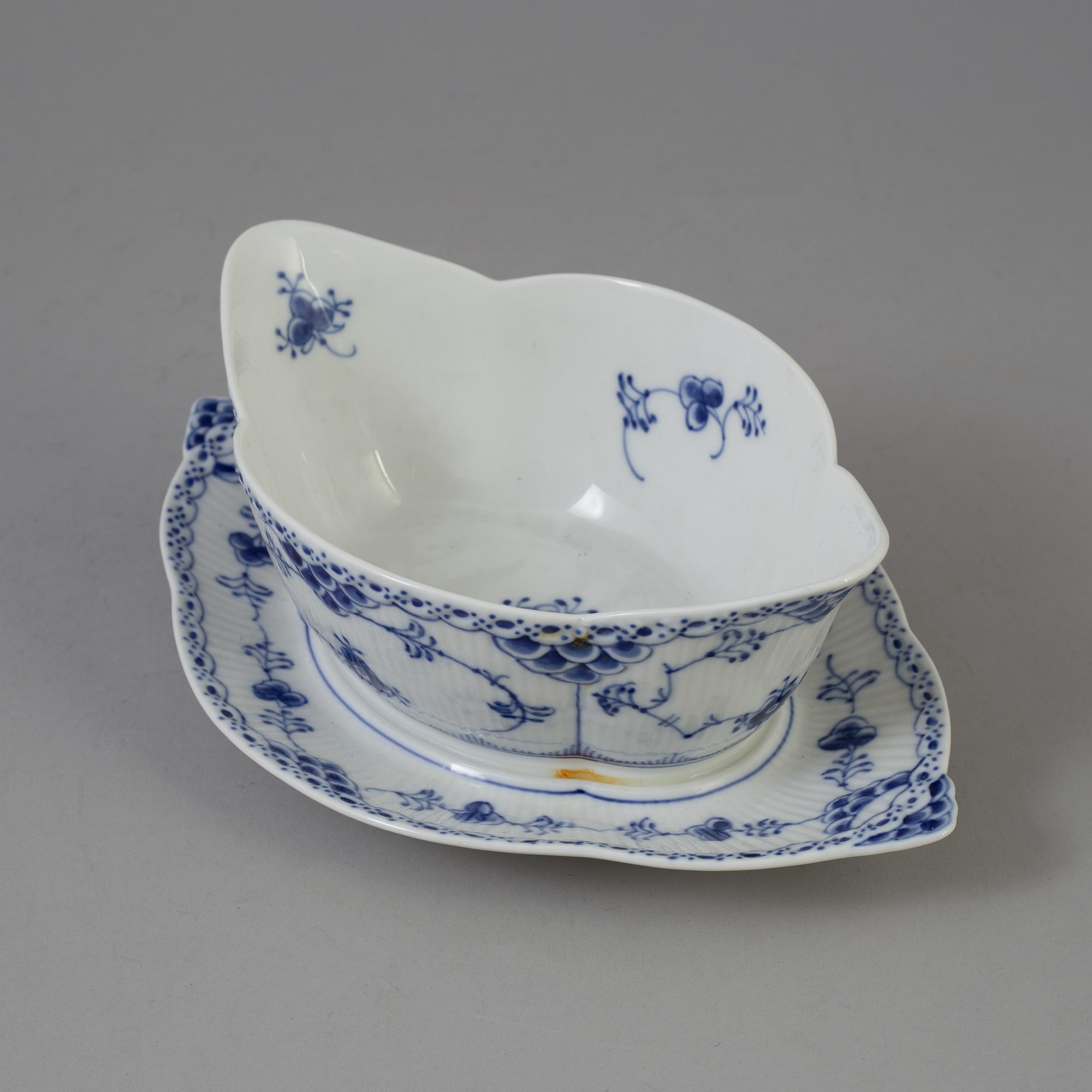 A set of 13 pieces Royal Copenhagen Blue Fluted Half-lace porcelain tableware.