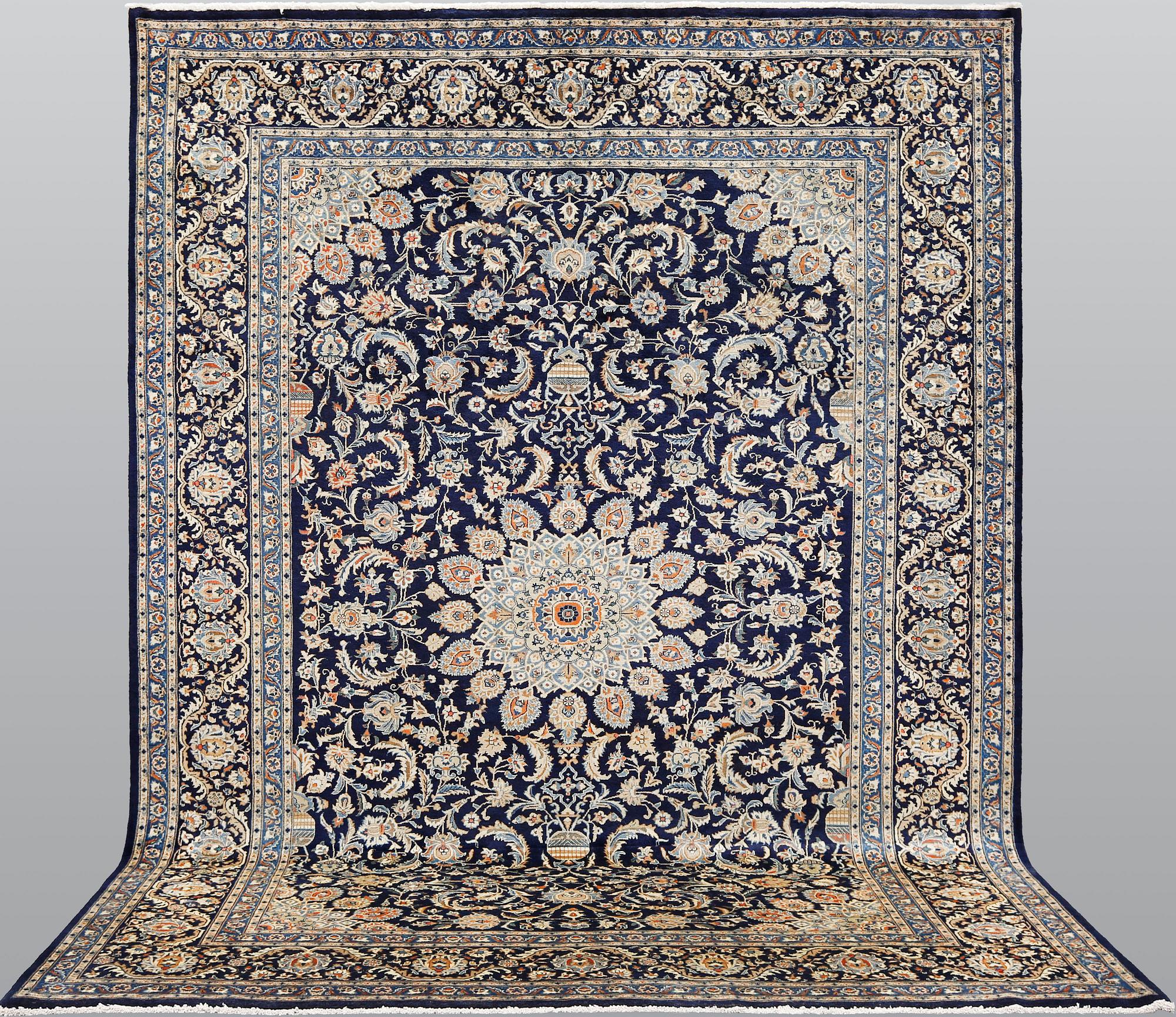 A Kashmar carpet, ca 340 x 253 cm.