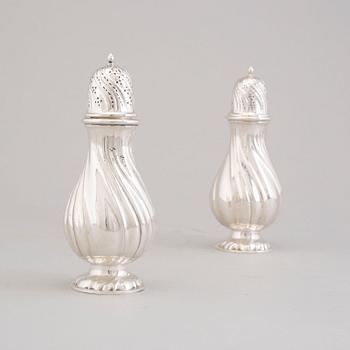 A pair of early 20th cenury silver sugar dispensers.