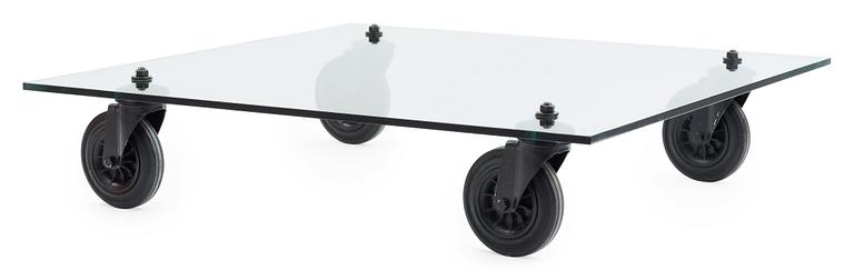 A Gae Aulenti 'Tavola con Ruote' table, Fontana Arte, Italy.