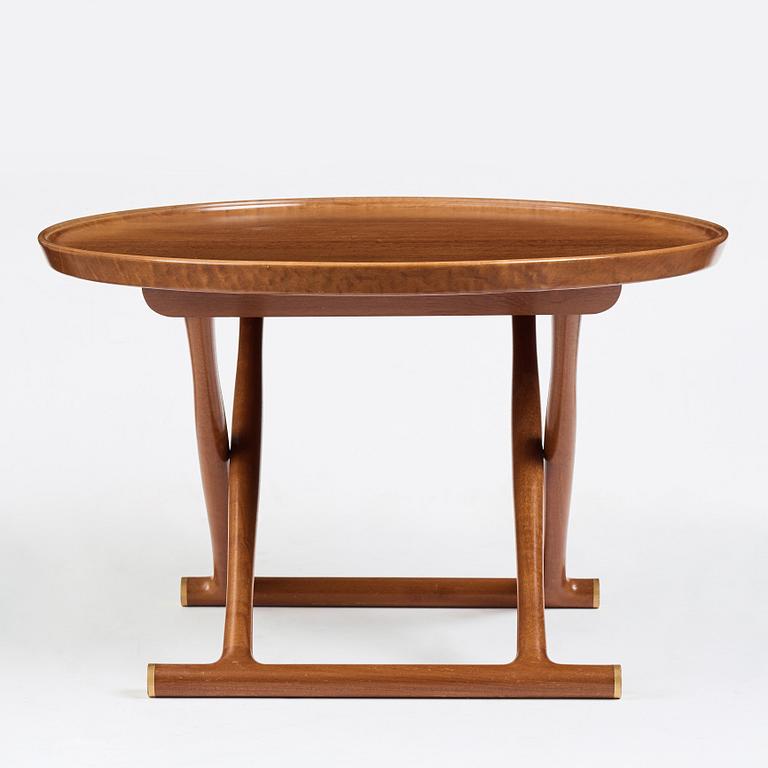 Mogens Lassen, a mahogany and brass "Egyptian Table", executed by A.J Iversen, Denmark.