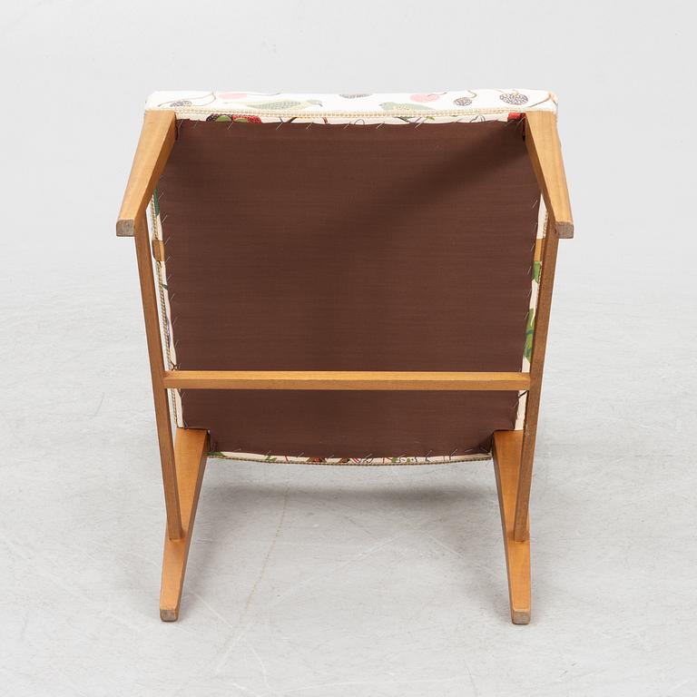 Josef Frank, a model 695 armchair, Firma Svenskt Tenn, Sweden.