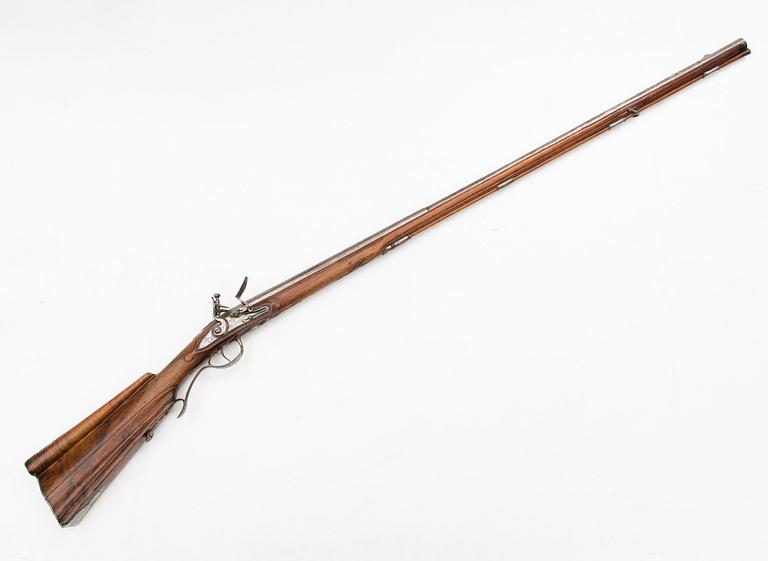 A flintlock rifle by Charles Bauduin, Liege, second half of 18th Century.