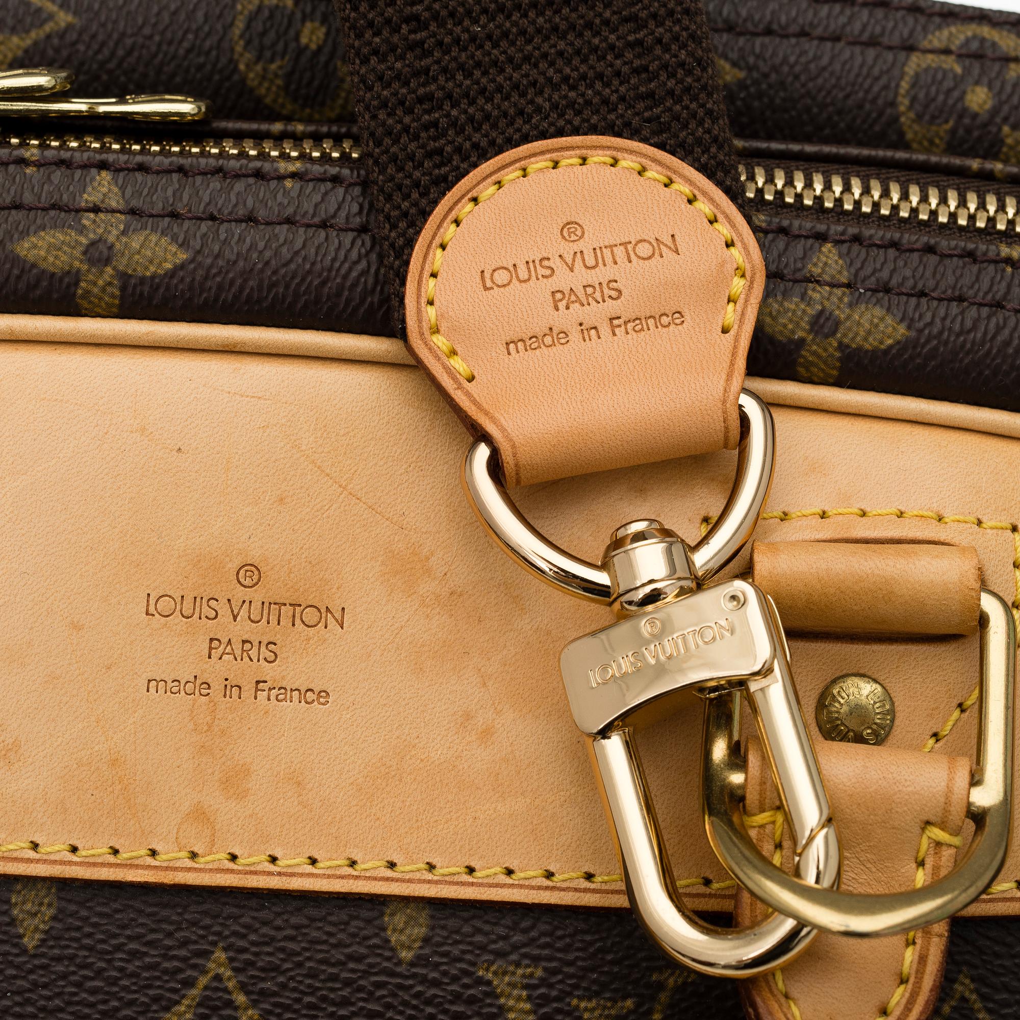 A Louis Vuitton, "Alize 24 Heures" Monogram Canvas Travel Bag.