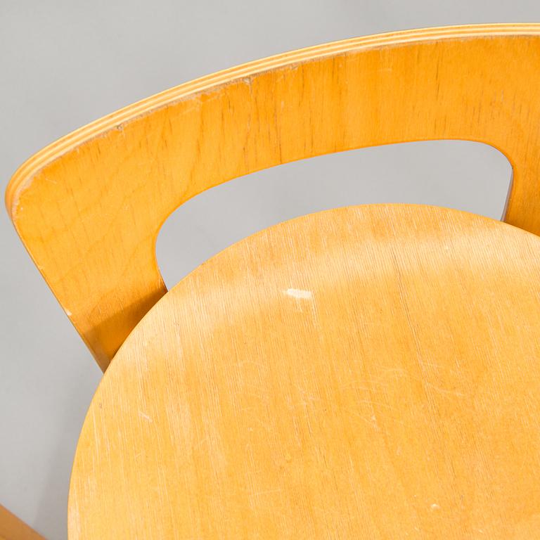 Alvar Aalto, A set of four K65 bar stools, Artek, Finland, late 20th century.