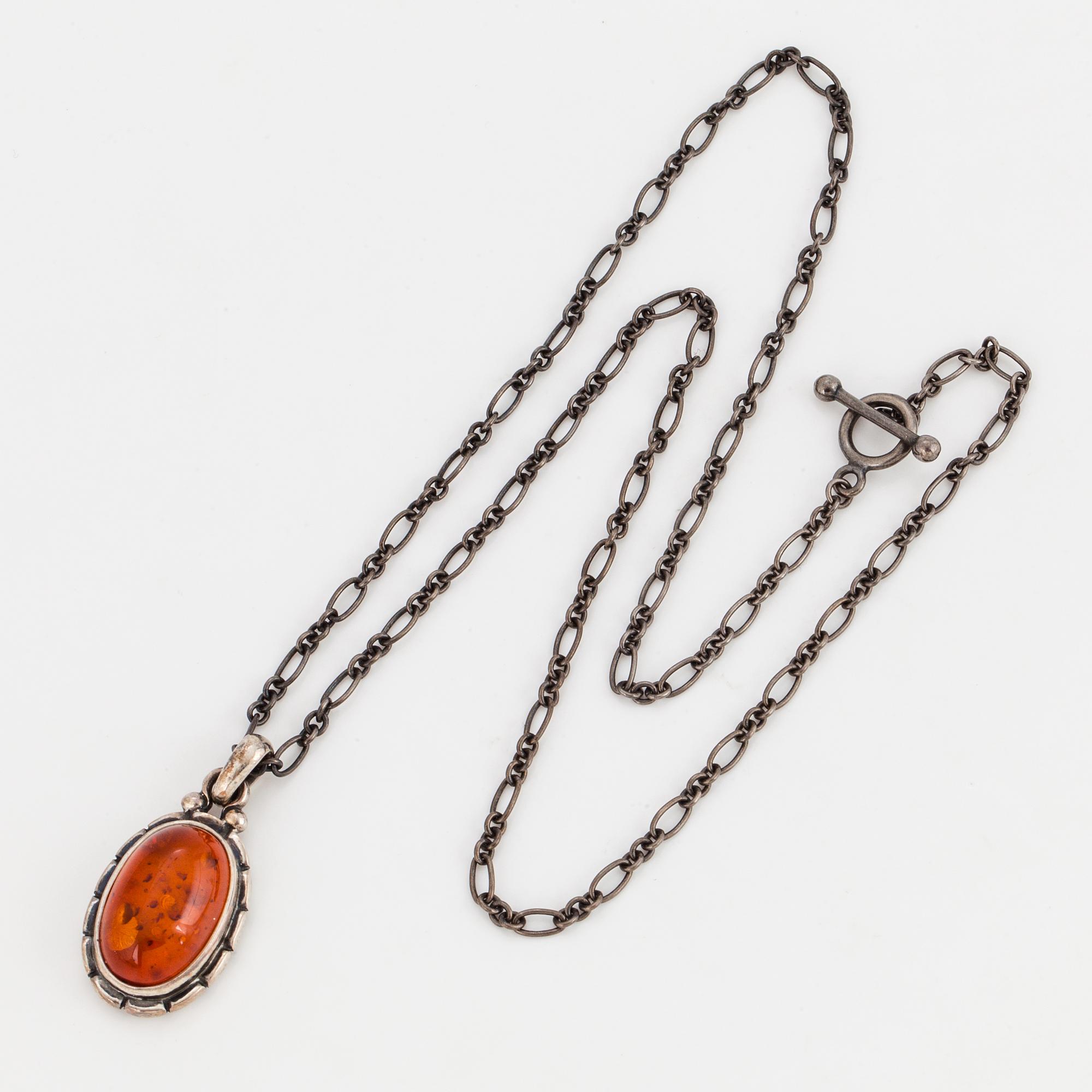 GEORG JENSEN, Pendant of the year 2001, with amber.