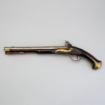 A 18th century flintlock pistol.