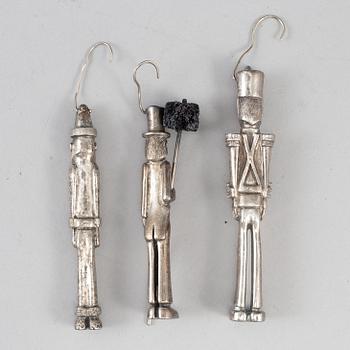 A set of three sterling figures.