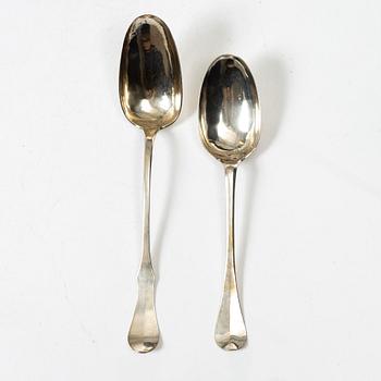 Two silver serving spoons with pseudo-marks, around the year 1900.