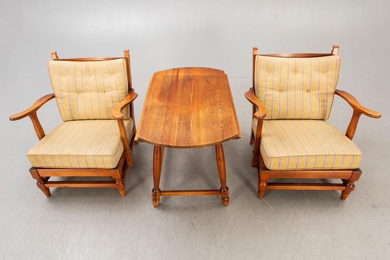 A set of two "Åre" armchairs and table by Gunnar Göpert 1940/50s.