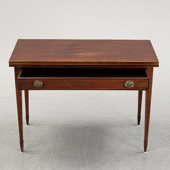 A mid 19th Century mahogany card table.