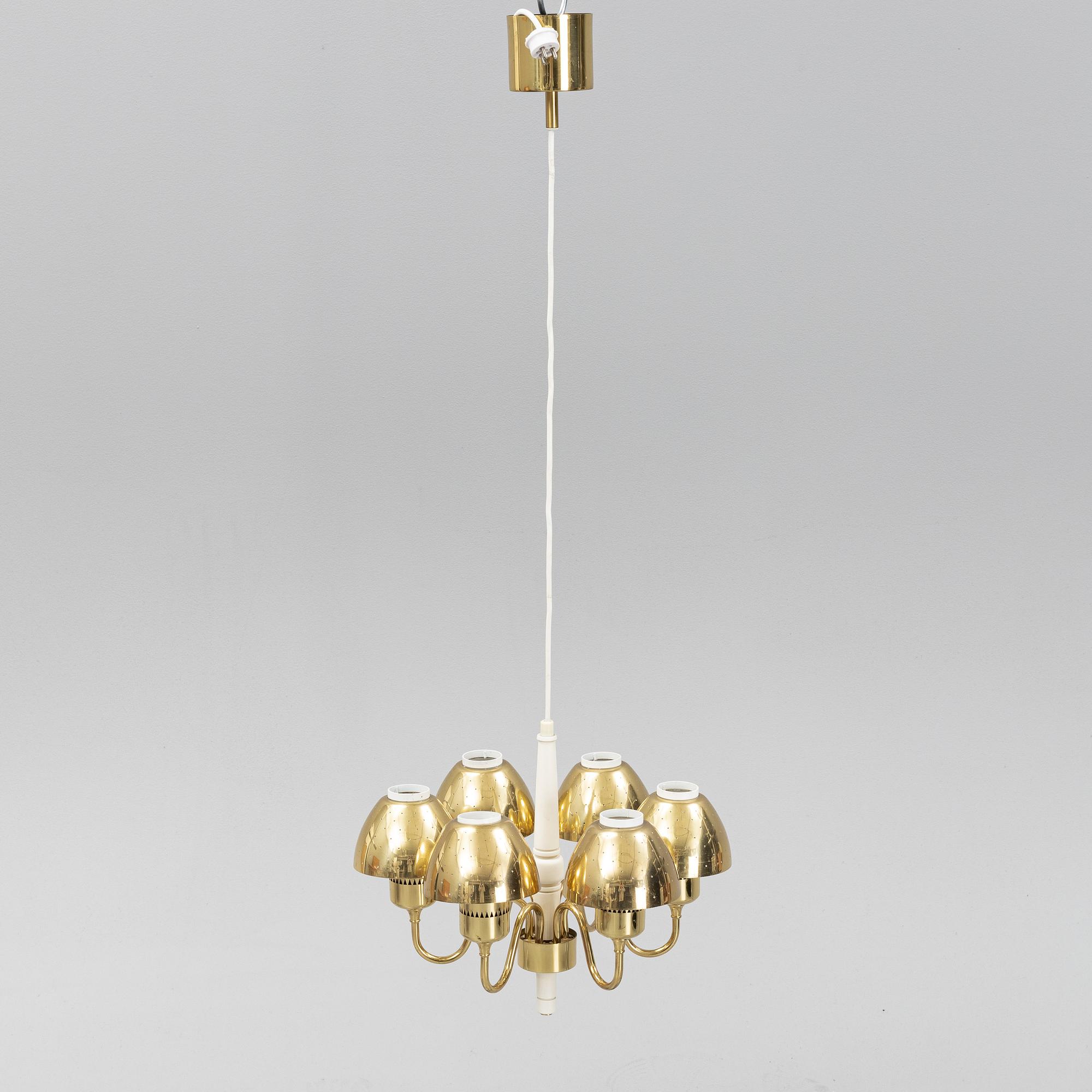 Hans-Agne Jakobsson, a 'T526' brass and wood ceiling light from Markaryd.