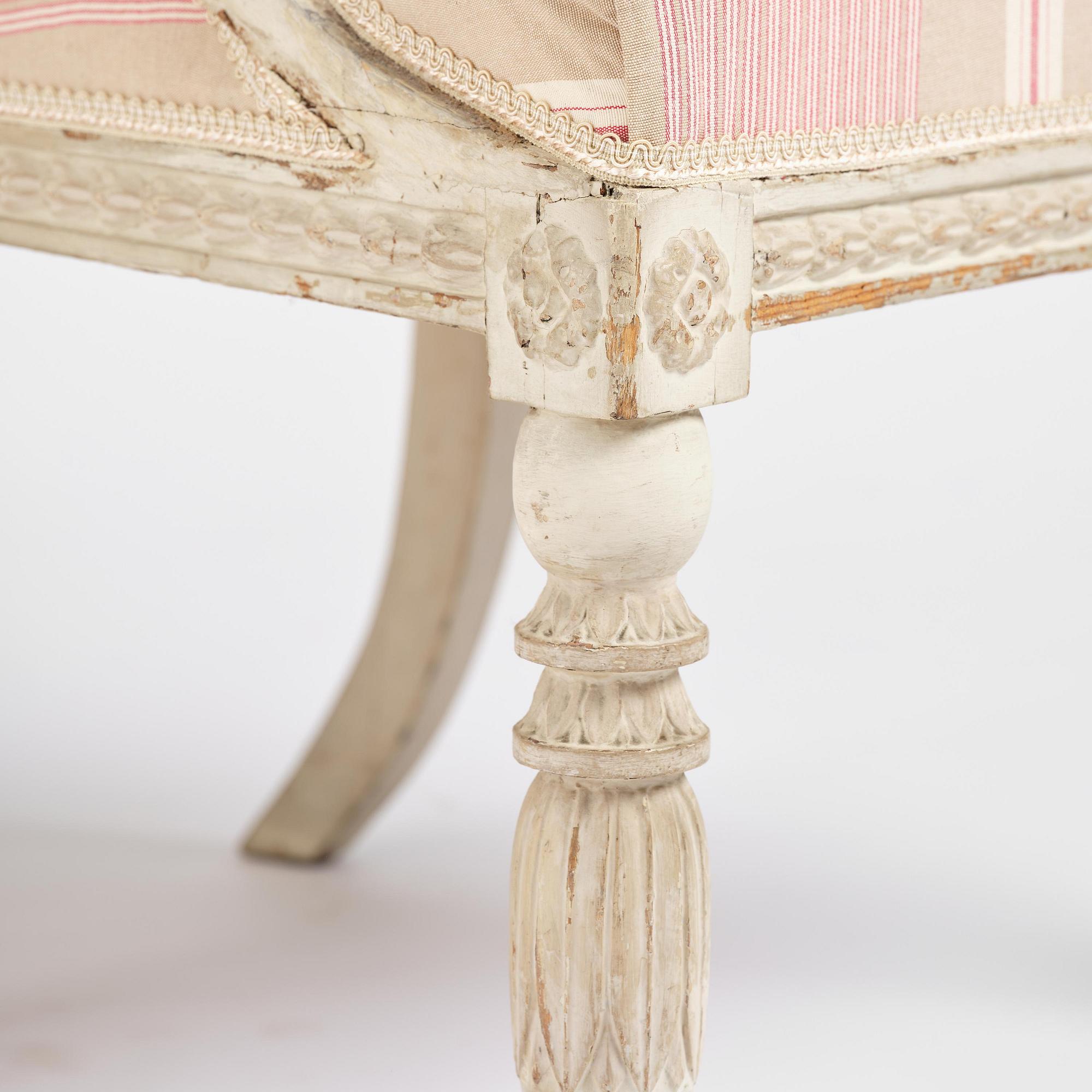 A pair of late Gustavian open.back armchairs, Stockholm, late 18th century.