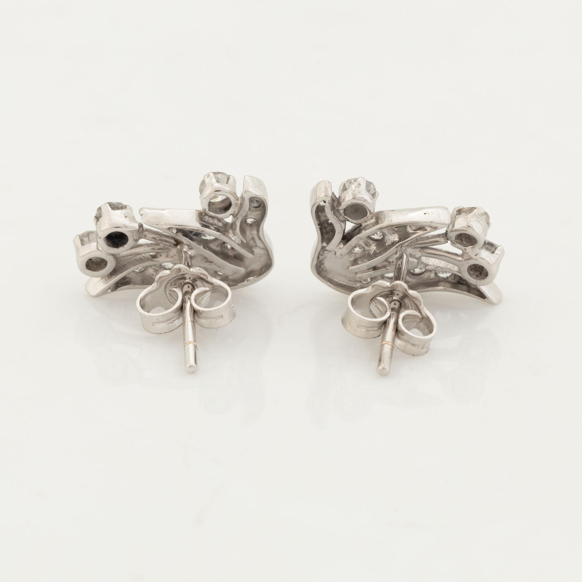 Diamond leaf earrings.