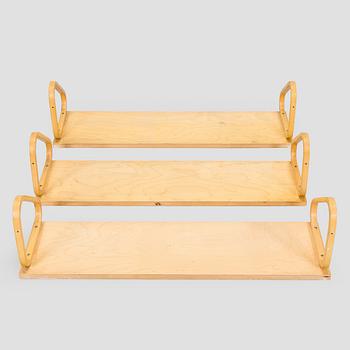 Alvar Aalto, three '112B' shelves, Artek, late 20th century.