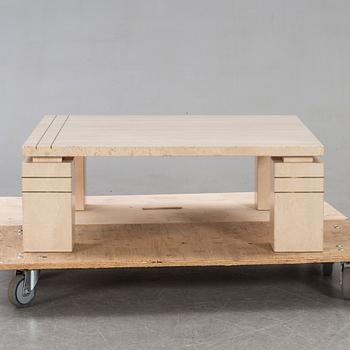 A 1970/80s travertin coffee table.
