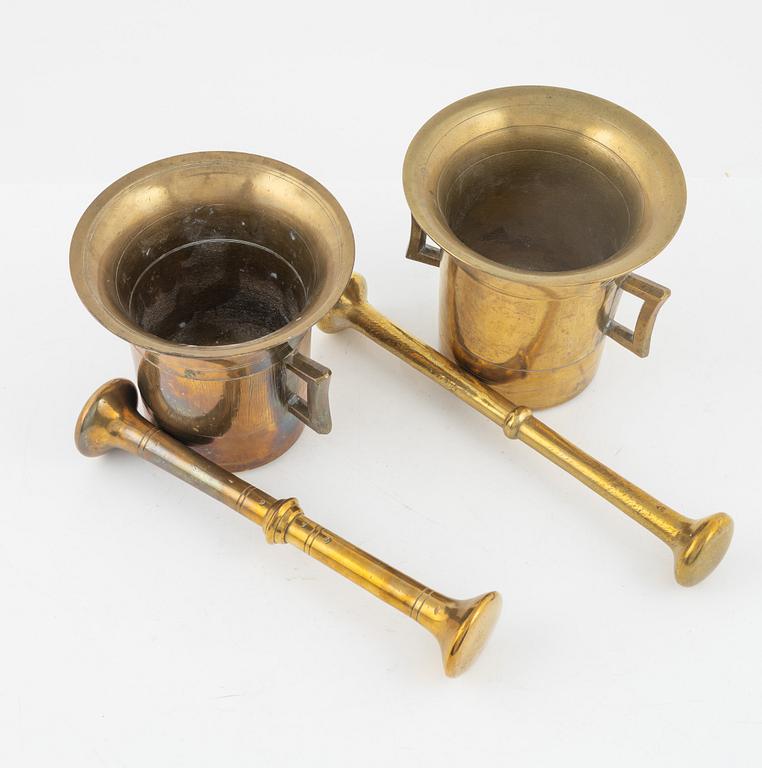 Two brass mortar and pestle, 1800's.